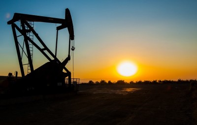 oil pumpjack at sunset